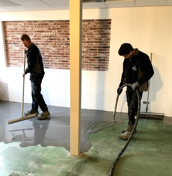 Flooring installation using F. Ball products at a Dutch dental practice.