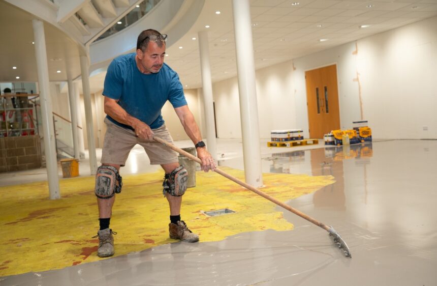 Flooring installation at Glasswells hardware store using F. Ball's Stopgap P141 primer and Stopgap 1200 smoothing compound.