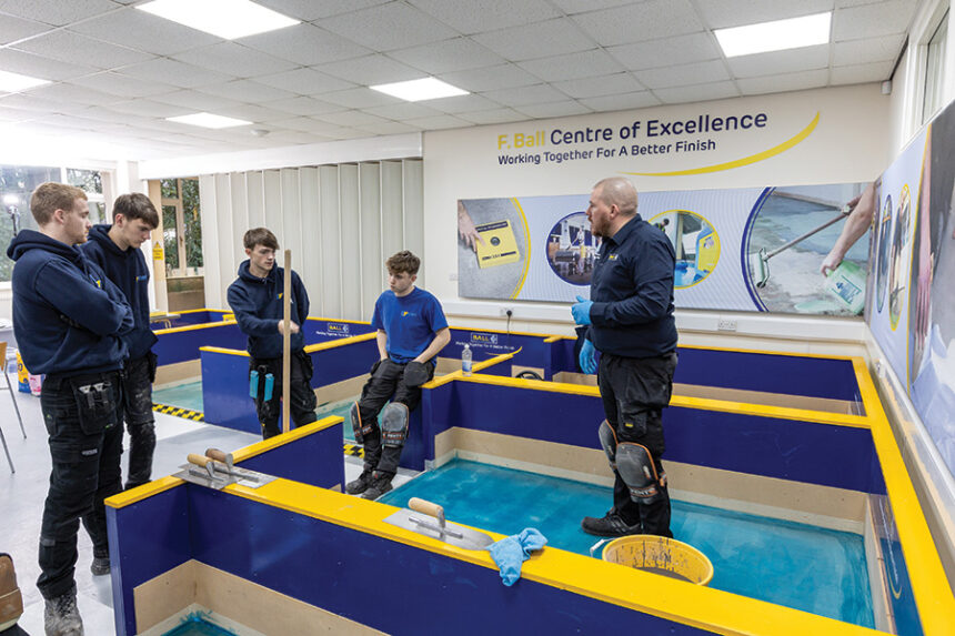 Apprentice flooring training at the F. Ball Centre of Excellence.